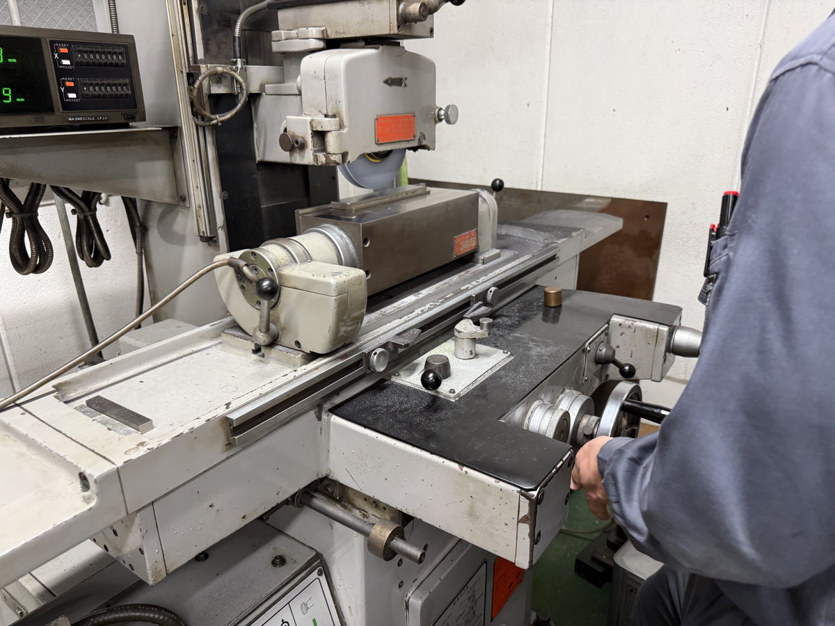 Tosho Seiko factory — surface grinding with digital readout